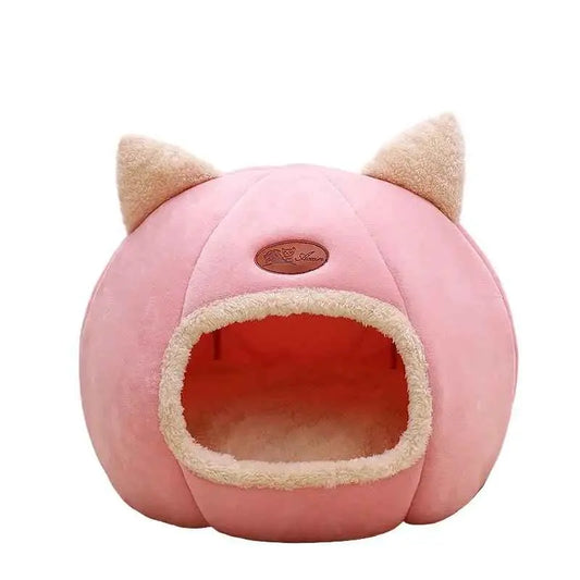 Pink Cat Cave Bed with cat ears on a white background