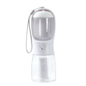 Portable pet water bottle with a white base and clear top on a white background