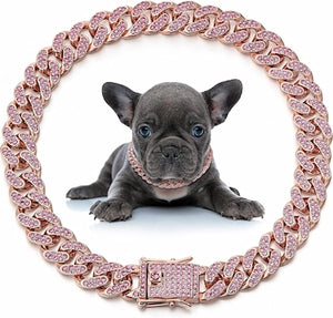 Dog wearing a pink Crystal Cuban Chain Pet Collar on a white background