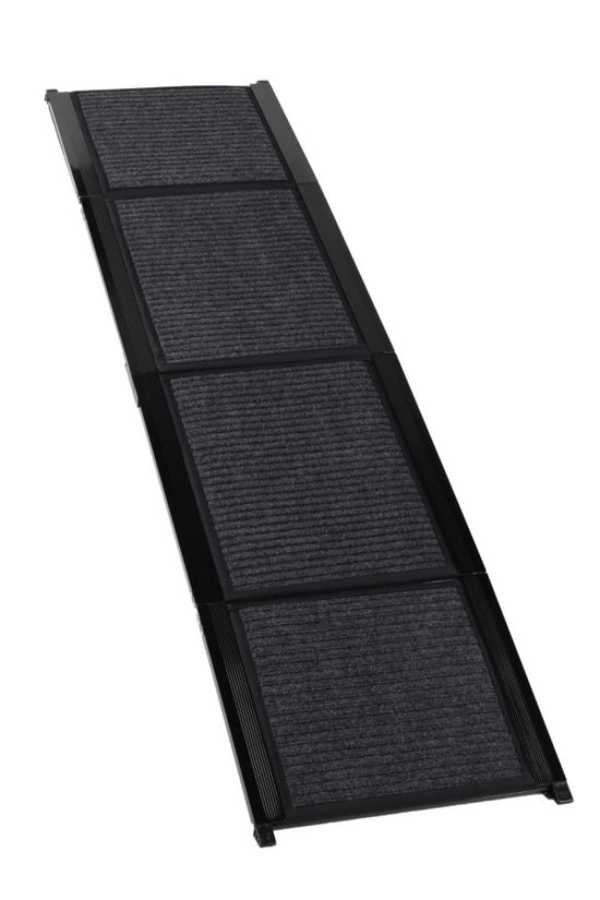 TravelBridge dog ramp fully unfolded, showing four hinged sections, a black frame, and a textured walking surface.
