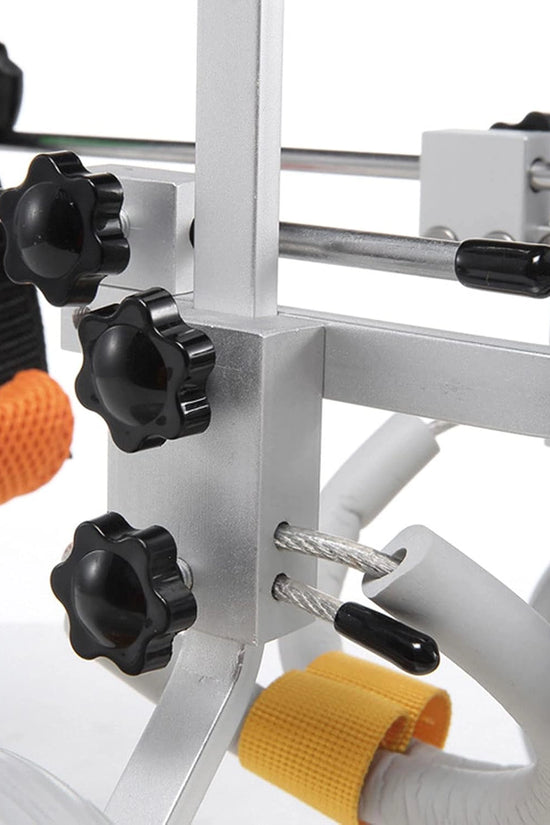 Freedom Walker wheelchair adjustment knobs close-up – Brown Vest & Silver Frame, showing precision sizing mechanism.