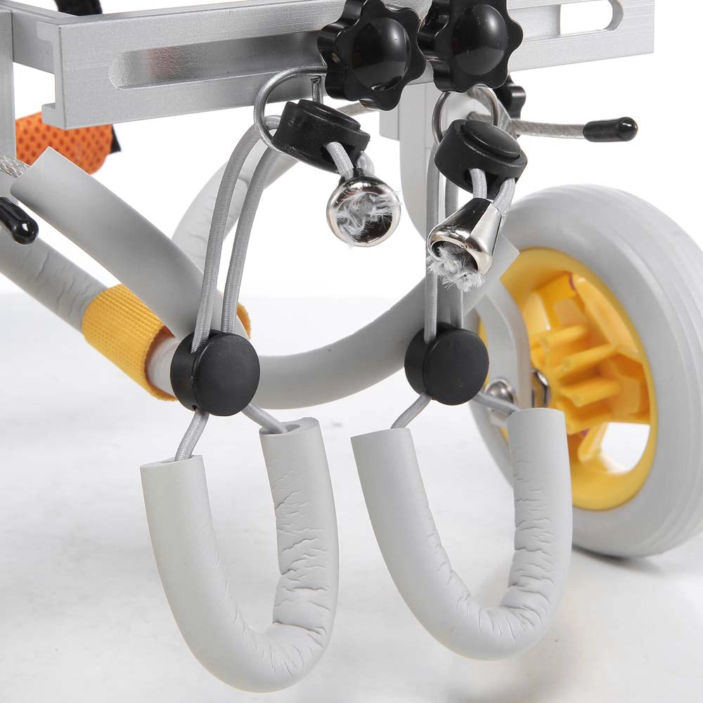 Freedom Walker dog wheelchair rear wheel close-up – gray rubber tire with yellow hub, both variants.