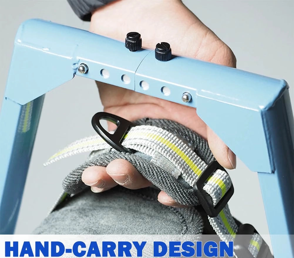 FrontRise Pro wheelchair frame folded and carried by hand, showing its lightweight, portable hand-carry design.